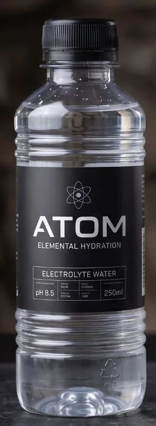 ATOM 250 ml ribbed bottle with a black wrap label