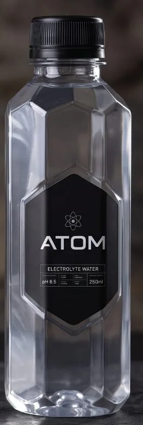 ATOM faceted bottle with a hexagonal label