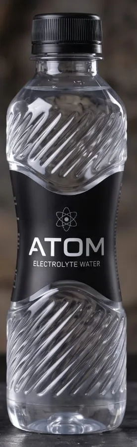ATOM bottle with a twisted grip and an hourglass label